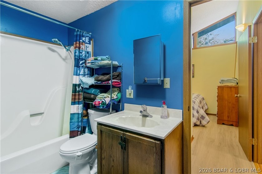 Looking for a 2-bedroom home in Lake Ozark sitting directly on - photo 31