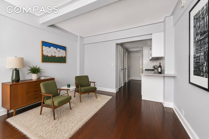 Step into this beautifully renovated pre-war studio in one of - photo 3