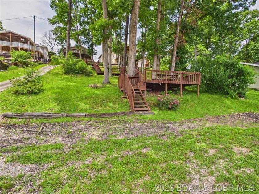 Enjoy lake living in this beautifully updated second-tier home - photo 32
