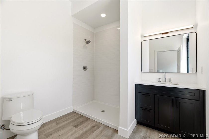 New construction with flat driveway, lake access w/included - photo 19