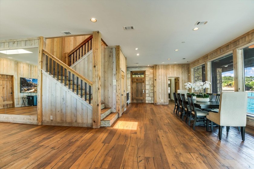 Beyond a gated entrance and beneath a canopy of mature live oaks - photo 8