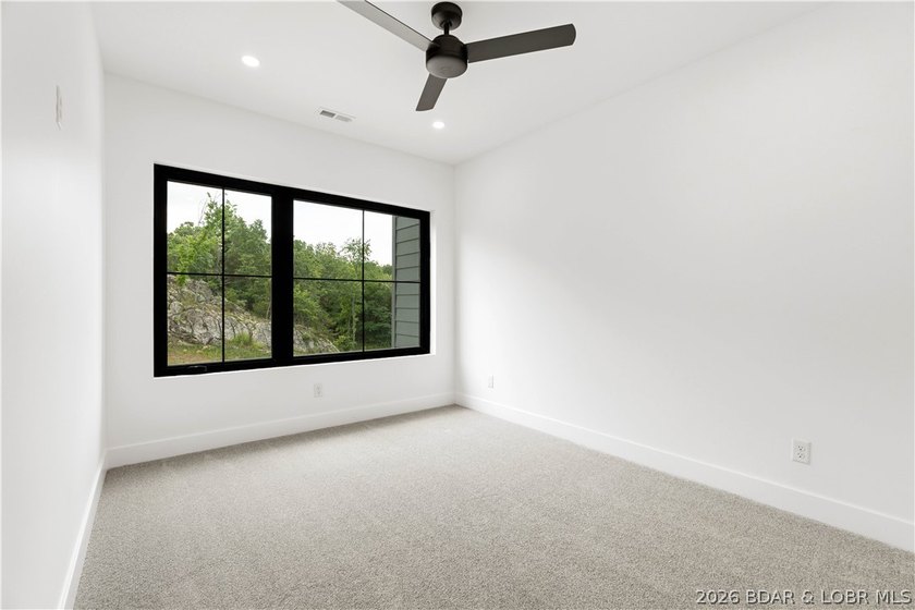 New construction with flat driveway, lake access w/included - photo 33
