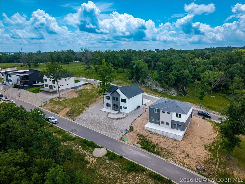 New construction with flat driveway, lake access w/included - photo 46