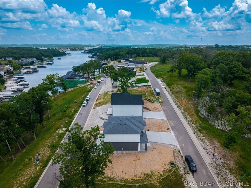 New construction with flat driveway, lake access w/included - photo 47