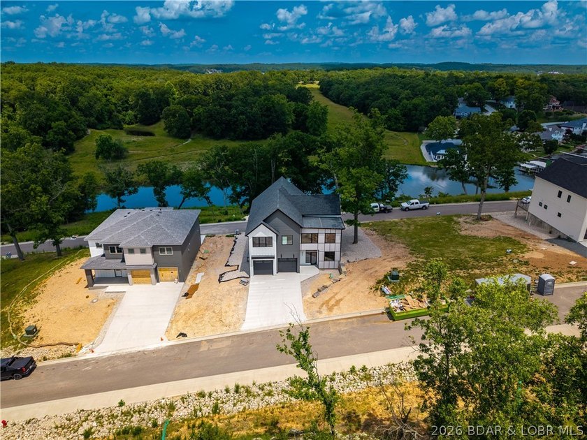 New construction with flat driveway, lake access w/included - photo 49