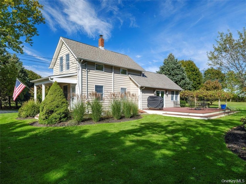 Set on 1.16 acres of beautifully landscaped and private grounds - photo 12