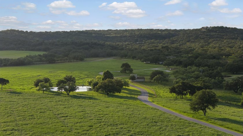 Beyond a private gated entrance, Martin Ranch unfolds as one of - photo 3