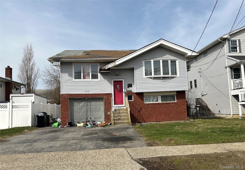 This Raised Ranch Home Features 3 Bedrooms, 2 Full Baths, Eat In - photo 3