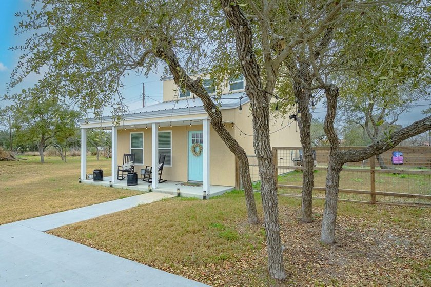 Nestled in the waterfront community of Holiday Beach, this - photo 5