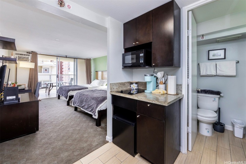 Situated in the center of Waikiki, Island Colony is a - photo 11