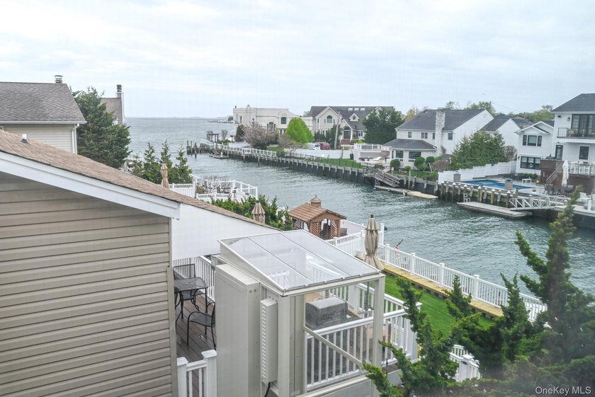 Experience the pinnacle of waterfront living at this spectacular - photo 11