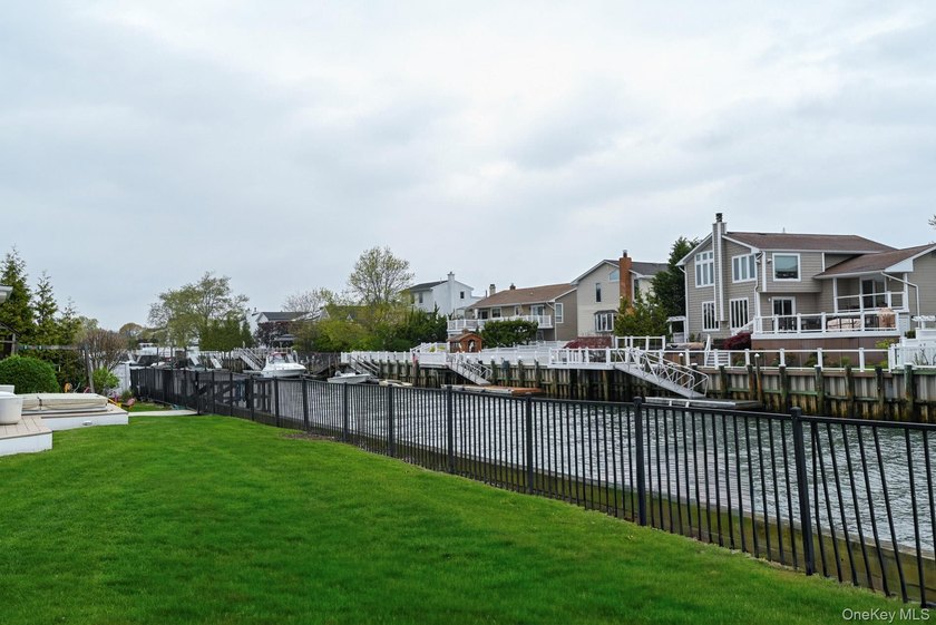 Experience the pinnacle of waterfront living at this spectacular - photo 12