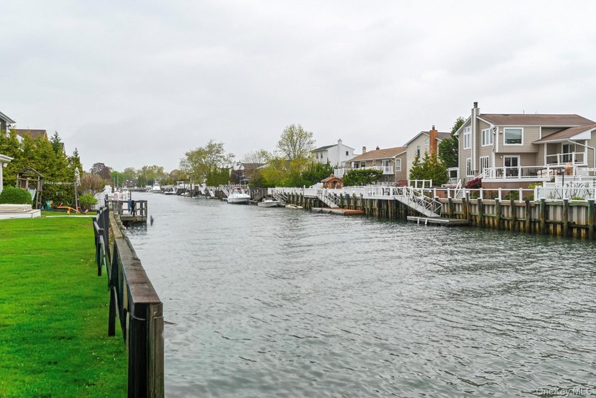 Experience the pinnacle of waterfront living at this spectacular - photo 13