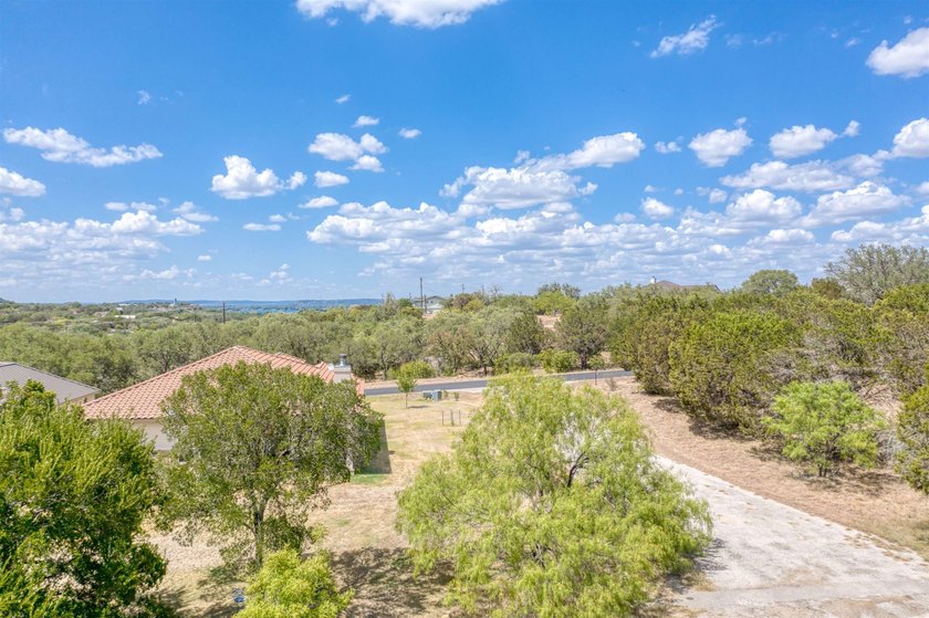 Gorgeous large lot that is fairly level with lots of trees! It - photo 3