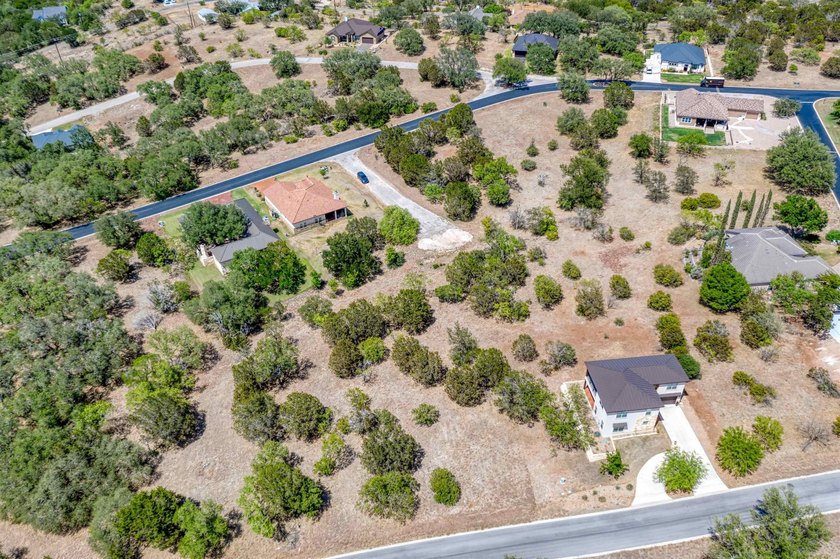 Gorgeous large lot that is fairly level with lots of trees! It - photo 5