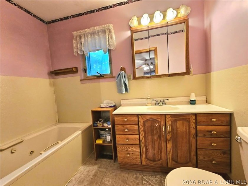 This 2-bedroom, 2-bath home offers lake access and is situated - photo 11