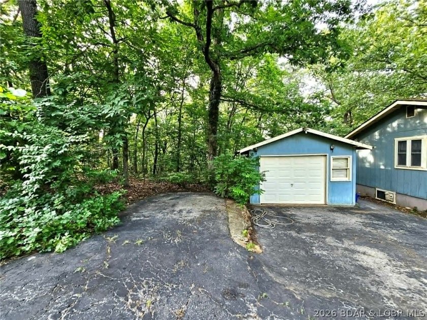 This 2-bedroom, 2-bath home offers lake access and is situated - photo 18
