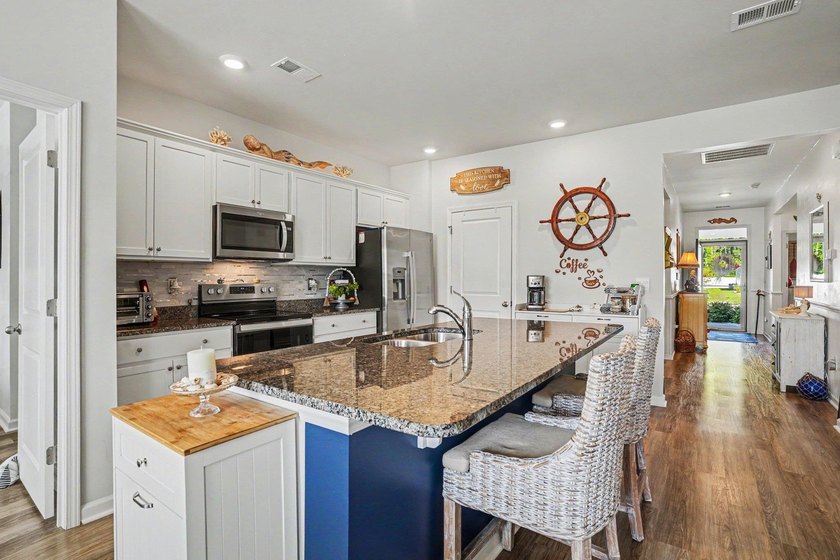 Welcome to 479 Samara Drive, a beautifully maintained home where - photo 11