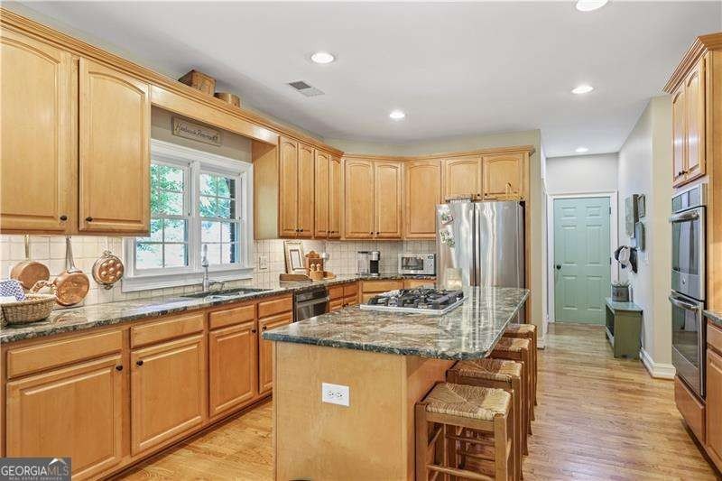 Welcome to this lovely custom ranch home with a bonus room! From - photo 13