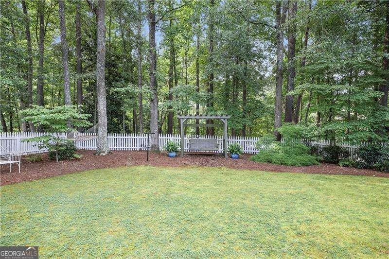 Welcome to this lovely custom ranch home with a bonus room! From - photo 32