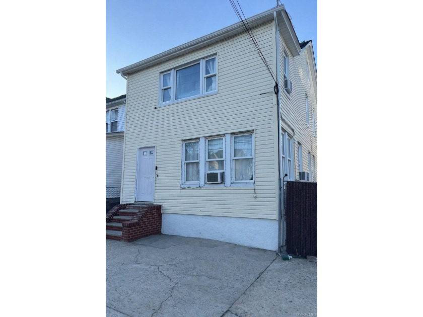 Welcome to a well-maintained two-family home offering - photo 2