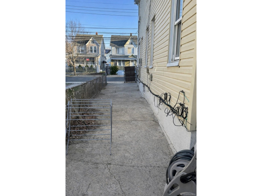 Welcome to a well-maintained two-family home offering - photo 3