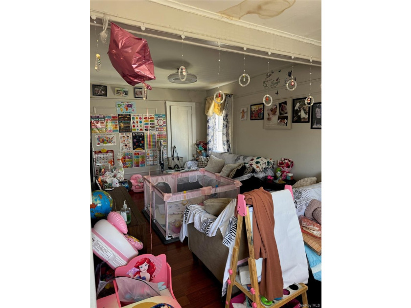 Welcome to a well-maintained two-family home offering - photo 8