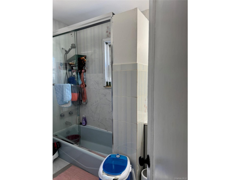 Welcome to a well-maintained two-family home offering - photo 10