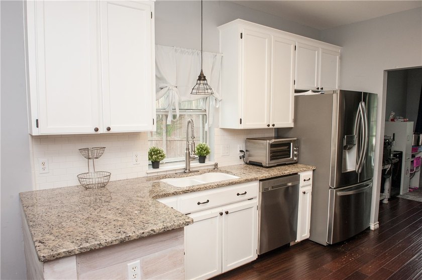 **Motivated Seller!** Spacious, updated, and move-in ready, this - photo 9