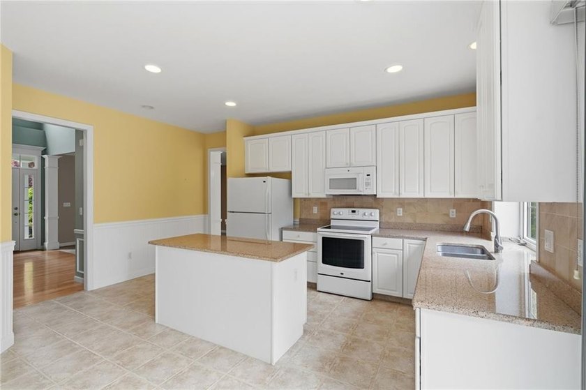 Welcome to Westford Woods! This beautifully maintained 4-bedroom - photo 17