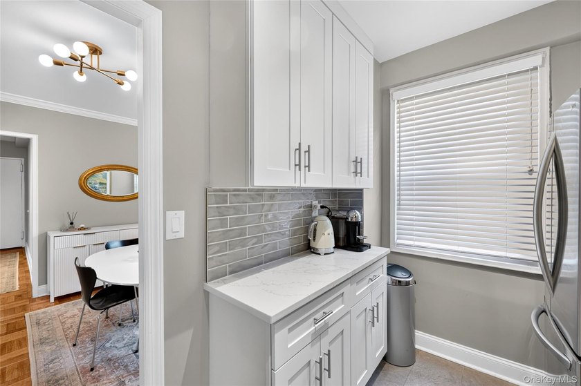 Welcome home to this light-filled, beautifully renovated - photo 14