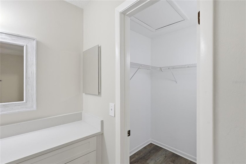 Welcome to this beautifully renovated second-floor condo in the - photo 24