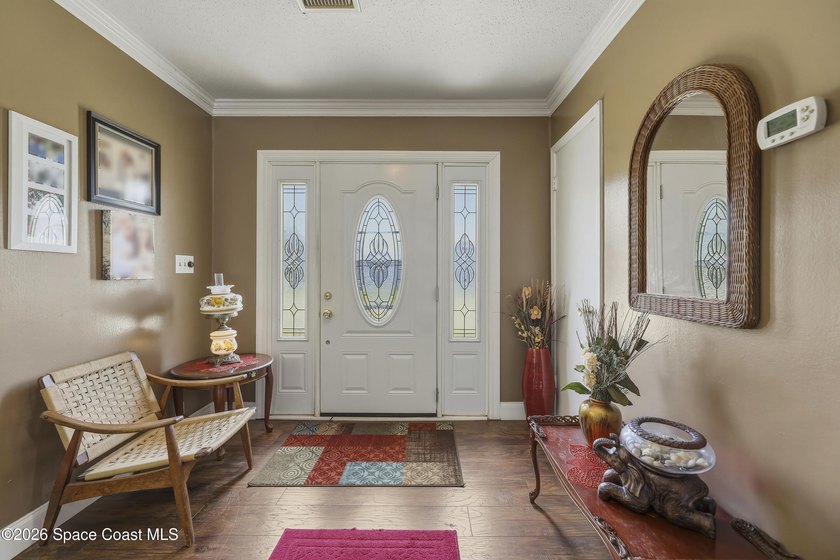 Welcome to this spacious 4-bedroom, 2.5-bath pool home located - photo 6