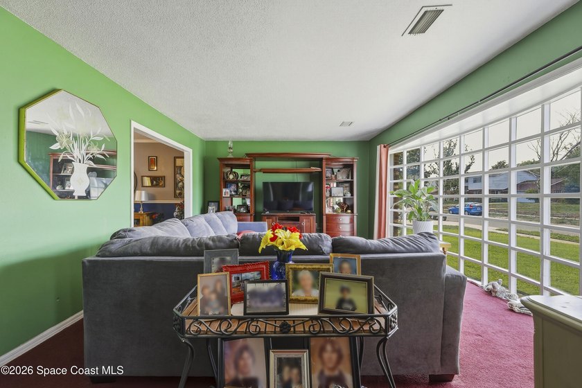 Welcome to this spacious 4-bedroom, 2.5-bath pool home located - photo 8