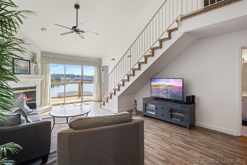 Indulge in stunning lake views from this remarkable 3-bedroom - photo 11