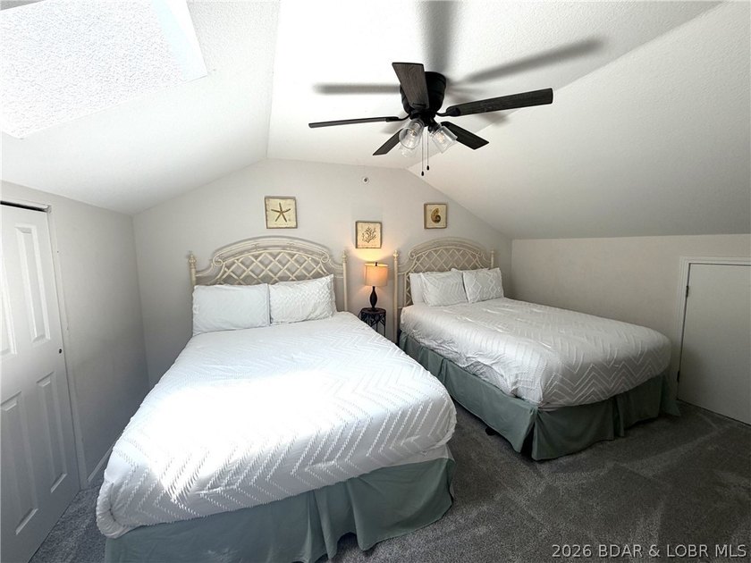 Indulge in stunning lake views from this remarkable 3-bedroom - photo 18