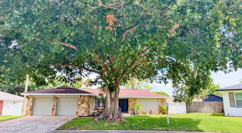 Welcome to 4205 Grovewood Ln! This stunning, move-in-ready - photo 2