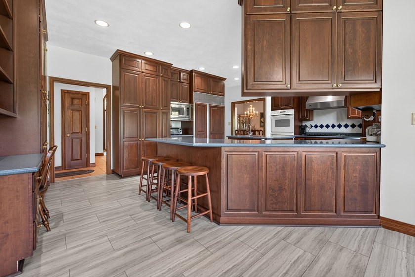 Welcome to this exceptional all-brick walkout 2-story home - photo 18