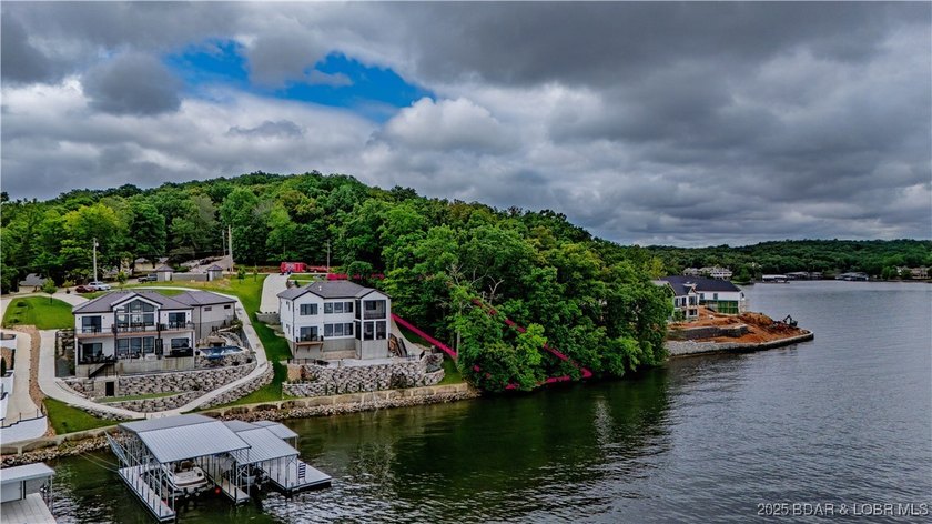 Build your dream lake home on this stunning lakefront lot - photo 3