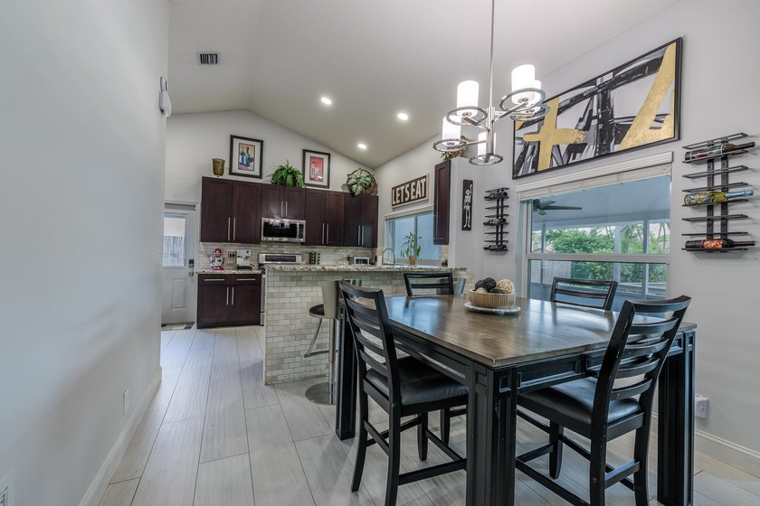 Step into this immaculate, model-like 3BR/2BA home with a den in - photo 12
