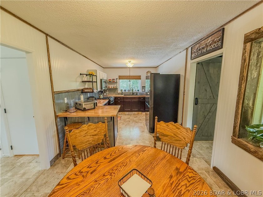 New price on this Lake area retreat on 3 acres with garage/RV - photo 13