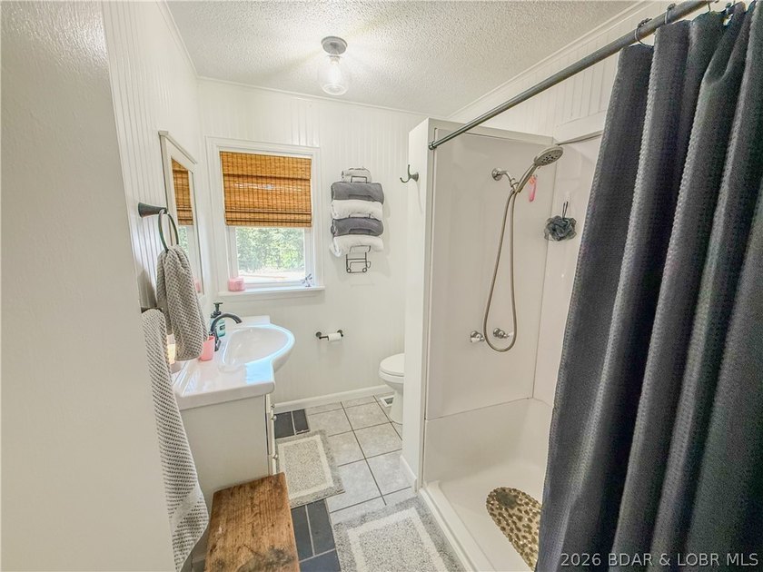 New price on this Lake area retreat on 3 acres with garage/RV - photo 16