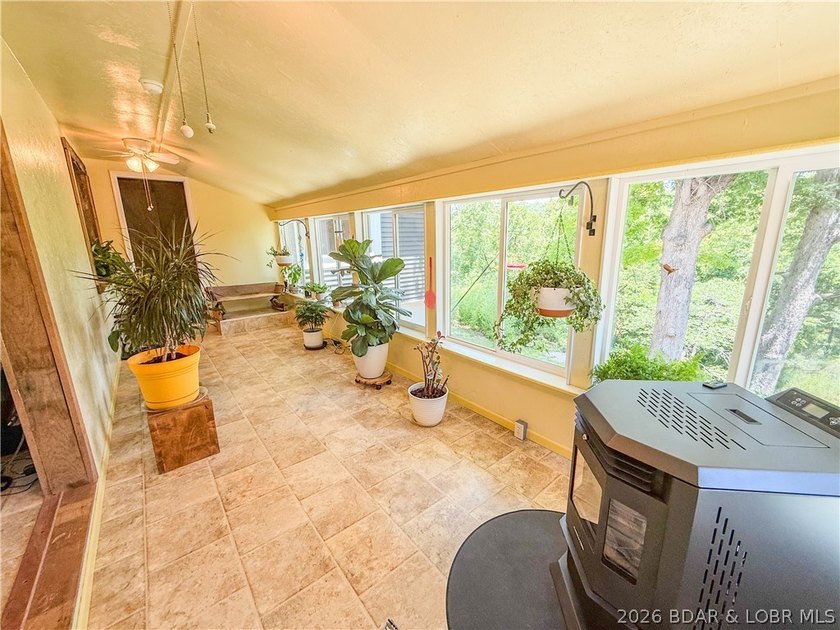 New price on this Lake area retreat on 3 acres with garage/RV - photo 17