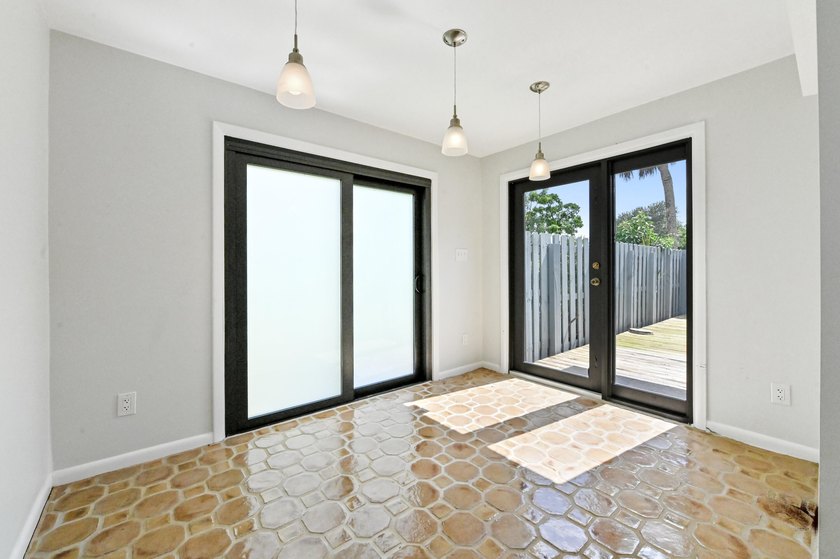 Corner unit villa features 2 bed, 2 bath, large den (could be a - photo 17