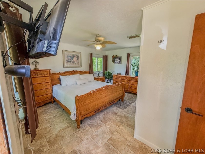 New price on this Lake area retreat on 3 acres with garage/RV - photo 24