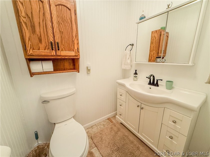 New price on this Lake area retreat on 3 acres with garage/RV - photo 25