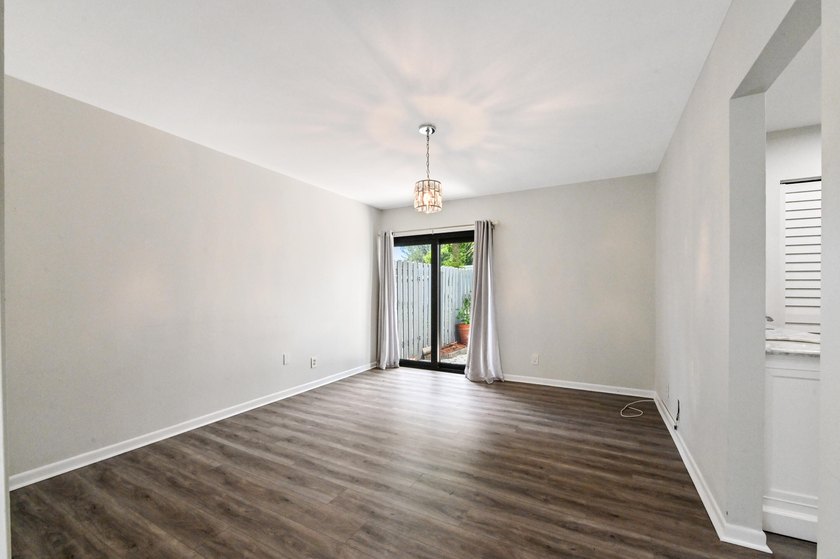 Corner unit villa features 2 bed, 2 bath, large den (could be a - photo 26