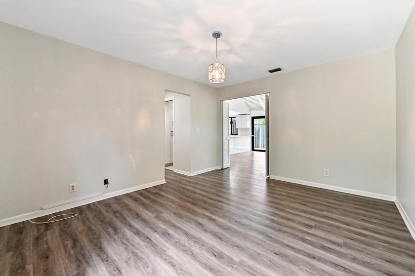 Corner unit villa features 2 bed, 2 bath, large den (could be a - photo 28