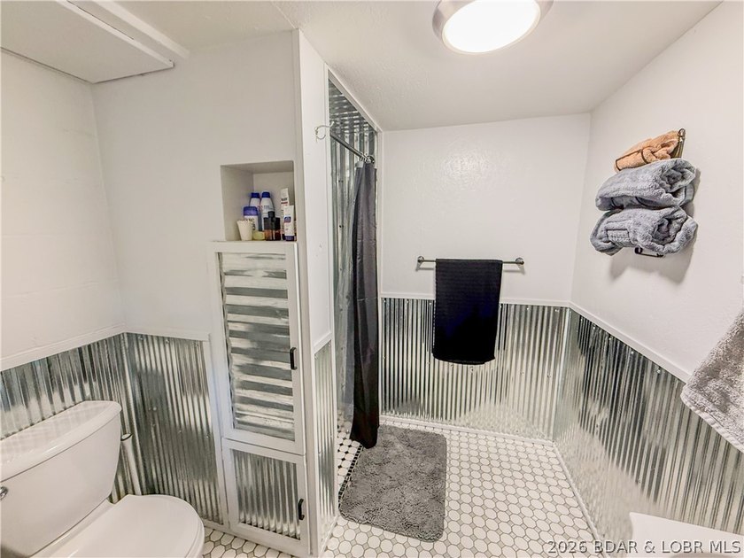 New price on this Lake area retreat on 3 acres with garage/RV - photo 36