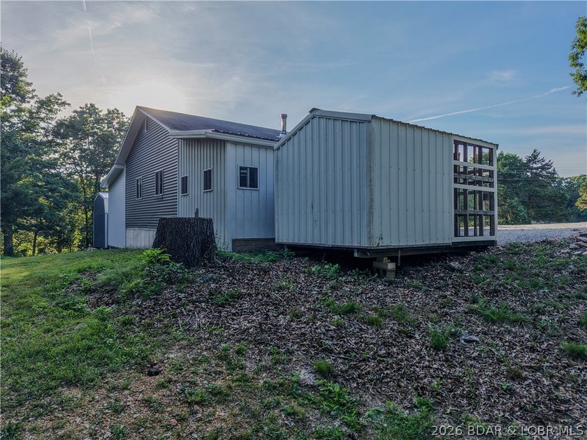 New price on this Lake area retreat on 3 acres with garage/RV - photo 40